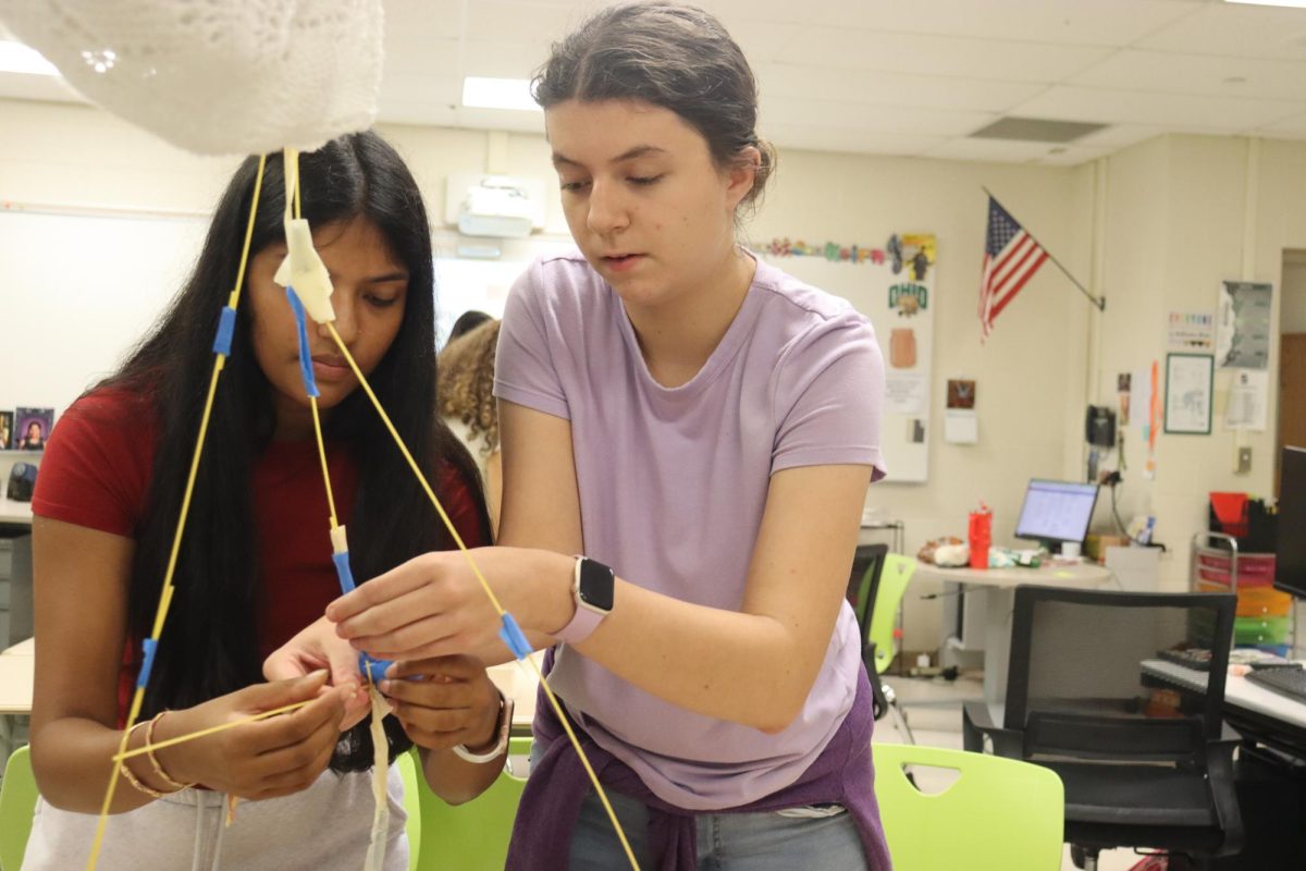 The pressure of senior year builds as the year goes on. At the beginning of the year, McKenzie Chavayda, senior, and Vrunda Desai, senior build a spaghetti tower in yearbook, but at the end of the year, they are under pressure to finish over a hundred pages in the last few weeks of school. 